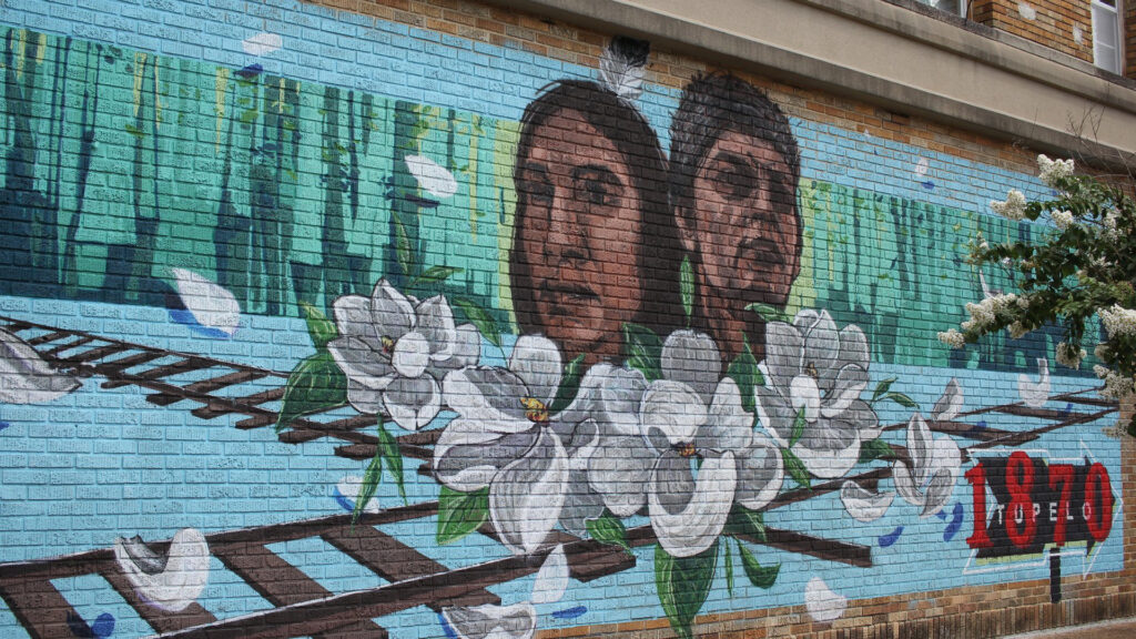 This Chickasaw Heritage Mural in Tupelo was painted by local artists Lujan Perez and MJ Torrecampo to commemorate Chickasaw leaders.