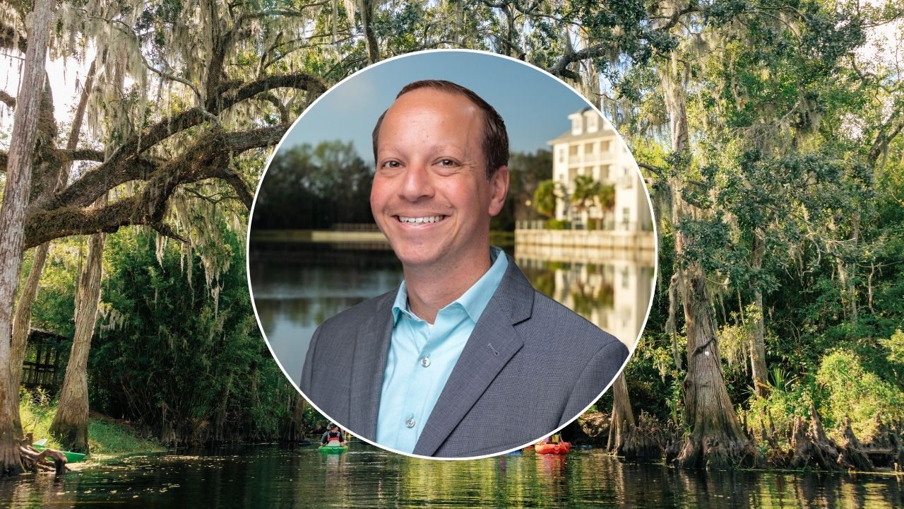 Headshot of Jason Holic on top of an Everglades background.